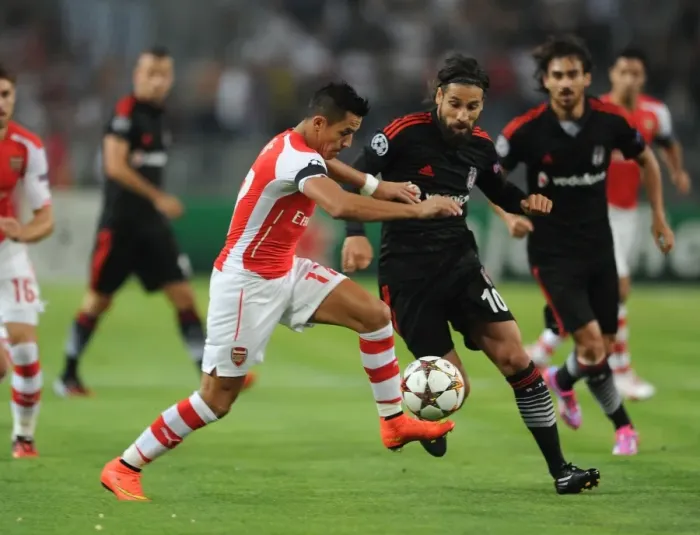 Framed Print : Clash of Stars: Sanchez vs. Sahan in Arsenal's UEFA Champions League Battle against Besiktas Framed Print : Clash of Stars: Sanchez vs. Sahan in Arsenal's UEFA Champions League Battle against Besiktas