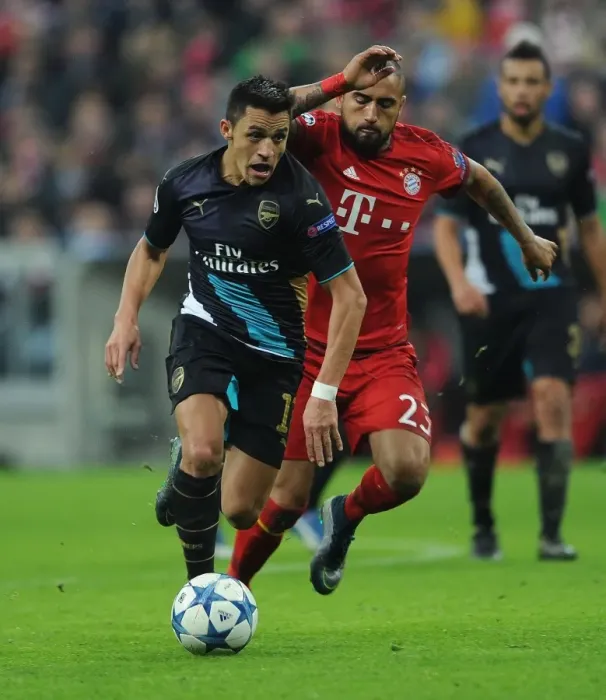 Framed Print : Clash of the Stars: Sanchez vs. Vidal - Bayern Munich vs. Arsenal UEFA Champions League Showdown Framed Print : Clash of the Stars: Sanchez vs. Vidal - Bayern Munich vs. Arsenal UEFA Champions League Showdown