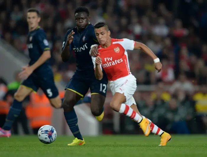 Framed Print : Clash of Stars: Sanchez vs. Wanyama in Arsenal's League Cup Battle Framed Print : Clash of Stars: Sanchez vs. Wanyama in Arsenal's League Cup Battle