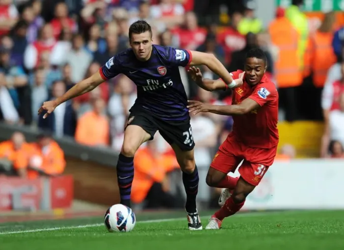 Framed Print : Clash of Talents: Jenkinson vs Sterling - Liverpool vs Arsenal, Premier League 2012-13