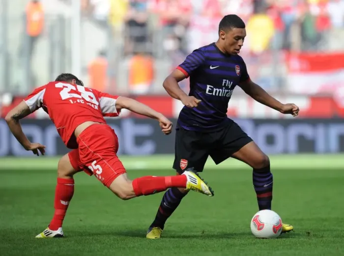 Framed Print : Clash of Talents: Oxlade-Chamberlain vs. Royer in Cologne Pre-Season Friendly Framed Print : Clash of Talents: Oxlade-Chamberlain vs. Royer in Cologne Pre-Season Friendly