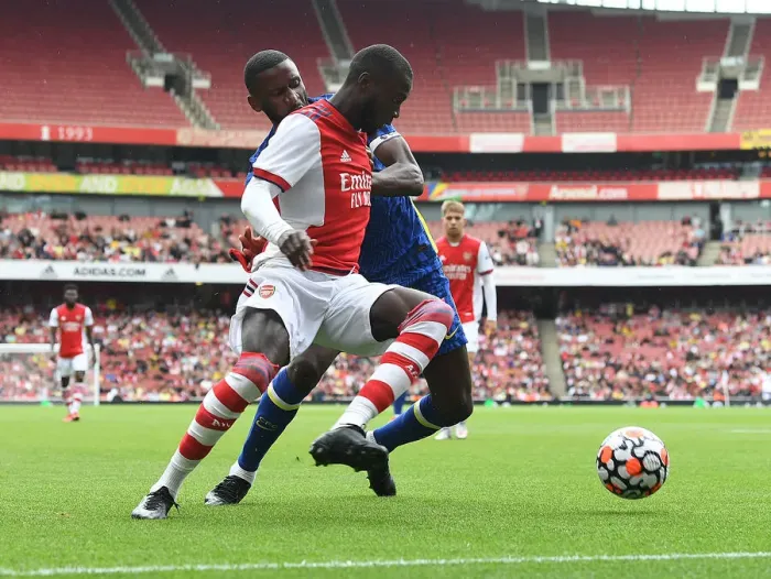Framed Print : Clash of Talents: Pepe vs. Loftus-Cheek - Arsenal vs. Chelsea Pre-Season Showdown