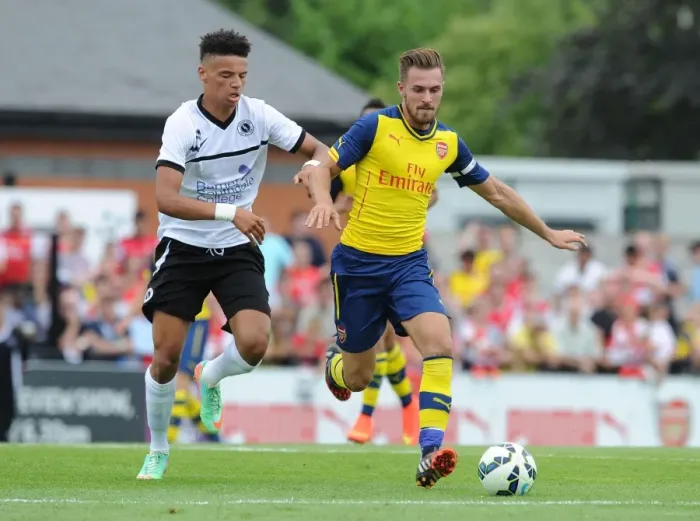 Framed Print : Clash of the Titans: Aaron Ramsey vs Lee Angol in Arsenal's Pre-Season Battle at Boreham Wood Framed Print : Clash of the Titans: Aaron Ramsey vs Lee Angol in Arsenal's Pre-Season Battle at Boreham Wood
