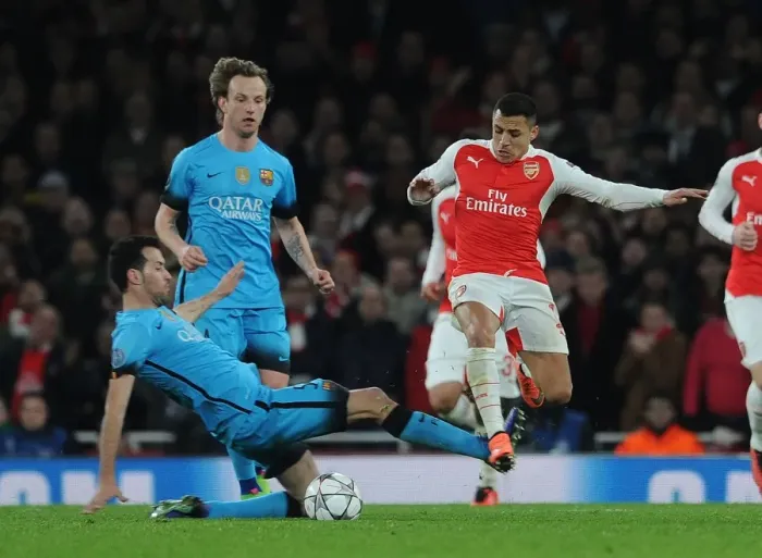 Framed Print : Clash of Titans: Alexis Sanchez Outwits Sergio Busquets in the Champions League Showdown Framed Print : Clash of Titans: Alexis Sanchez Outwits Sergio Busquets in the Champions League Showdown