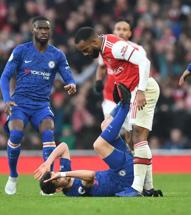 Framed Print : Clash of Titans: Arsenal's Lacazette vs. Chelsea's Jorginho in the Premier League Showdown Framed Print : Clash of Titans: Arsenal's Lacazette vs. Chelsea's Jorginho in the Premier League Showdown