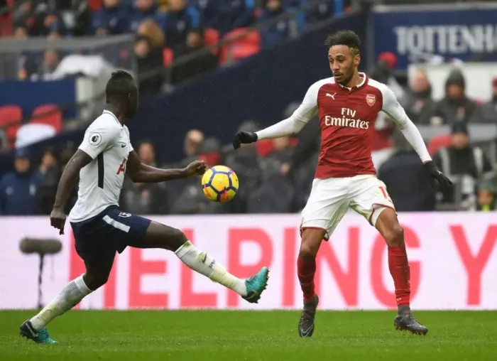 Framed Print : Clash of Titans: Aubameyang vs. Sanchez - Premier League Showdown: Arsenal's Aubameyang Goes Head-to-Head with Tottenham's Sanchez