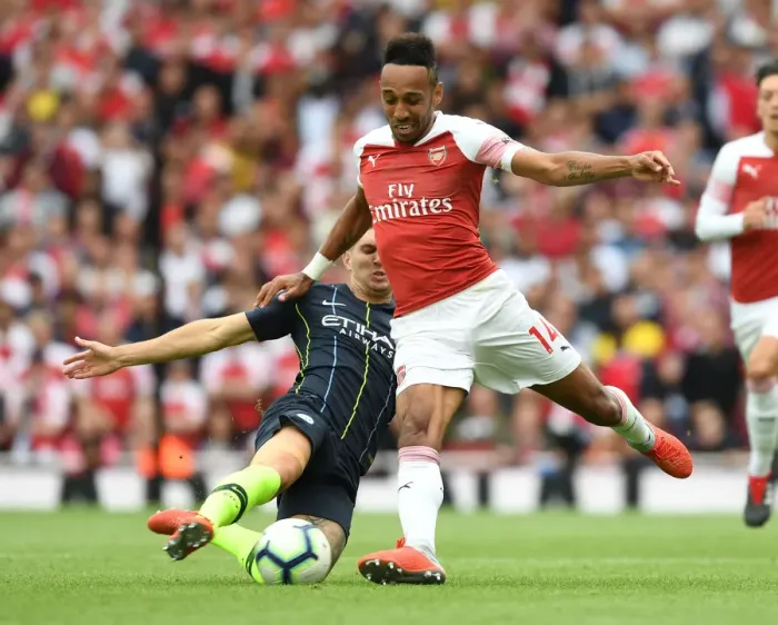 Framed Print : Clash of Titans: Aubameyang vs Stones - Arsenal v Manchester City, Premier League 2018-19 Framed Print : Clash of Titans: Aubameyang vs Stones - Arsenal v Manchester City, Premier League 2018-19