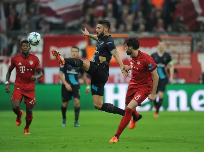Framed Print : Clash of Titans: A Battle of Strength and Skill - Olivier Giroud vs. Javi Martinez, UEFA Champions League Showdown Framed Print : Clash of Titans: A Battle of Strength and Skill - Olivier Giroud vs. Javi Martinez, UEFA Champions League Showdown