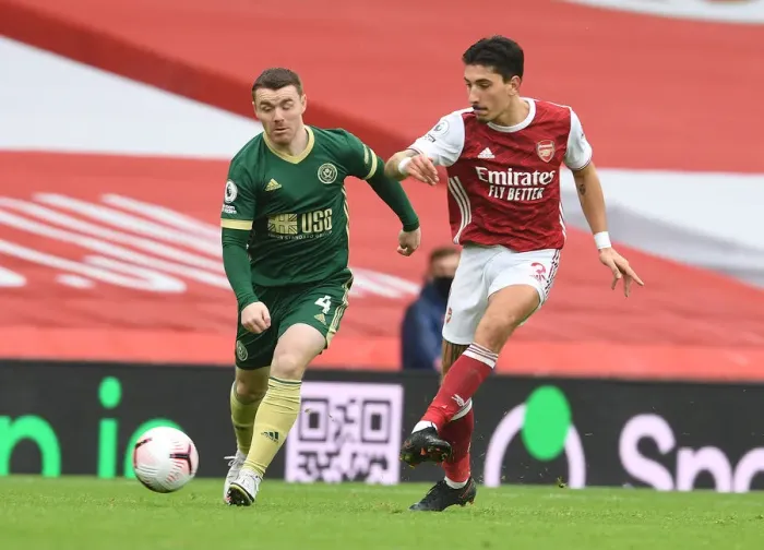 Framed Print : Clash of the Titans: Bellerin vs Fleck in Empty Emirates Stadium - Arsenal vs Sheffield United, Premier League 2020-21