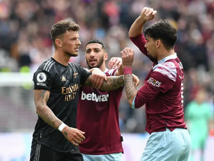 Framed Print : Clash of Titans: Ben White Faces Off Against West Ham's Said Benrahma and Lucas Paqueta in the Premier League Showdown