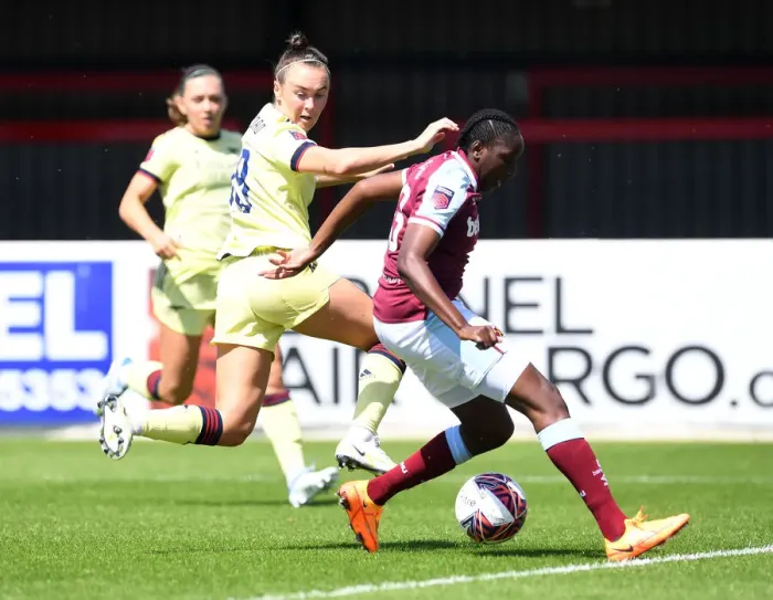 Framed Print : Clash of Titans: Caitlin Foord vs. Hawa Cissoko - Intense Battle: West Ham Women vs. Arsenal Women, FA WSL Showdown
