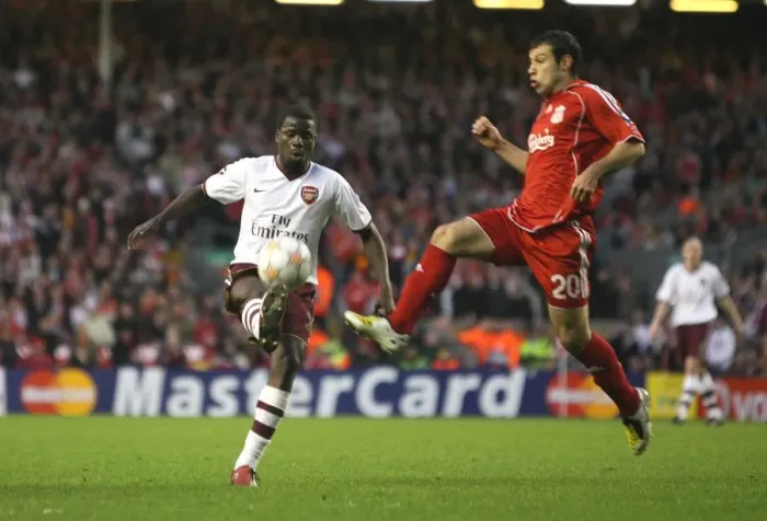 Framed Print : Clash of Titans: Eboue vs Mascherano in the Intense Liverpool vs Arsenal UEFA Champions League Quarterfinal (4:2 in favor of Liverpool)