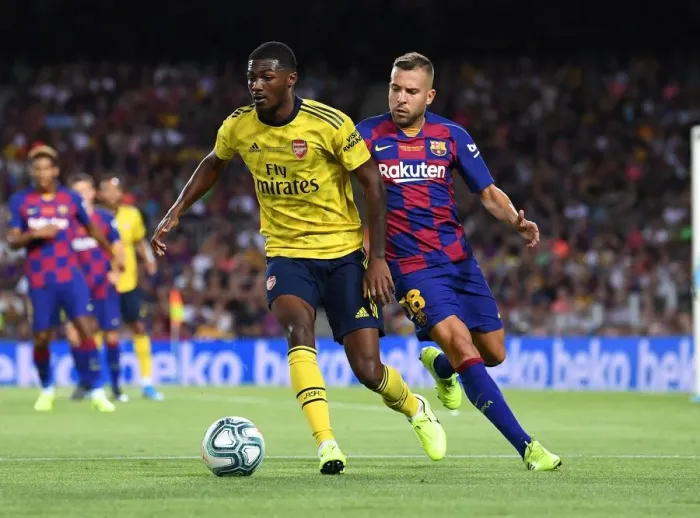 Framed Print : Clash of Titans: FC Barcelona vs. Arsenal - Ainsley Maitland-Niles vs. Jordi Alba