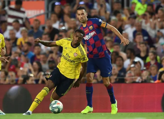 Framed Print : Clash of Titans: FC Barcelona vs. Arsenal - Joe Willock vs. Sergio Busquets