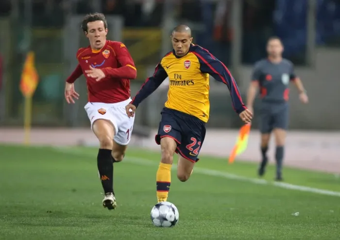 Framed Print : Clash of Titans: Gael Clichy vs. Rodrigo Taddei - Dramatic UEFA Champions League Showdown at Stadio Olympico (11 / 3 / 2009)