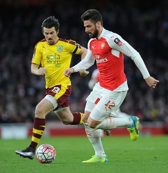 Clash of the Titans: Giroud vs. Barton in Arsenal's FA Cup Battle against Burnley