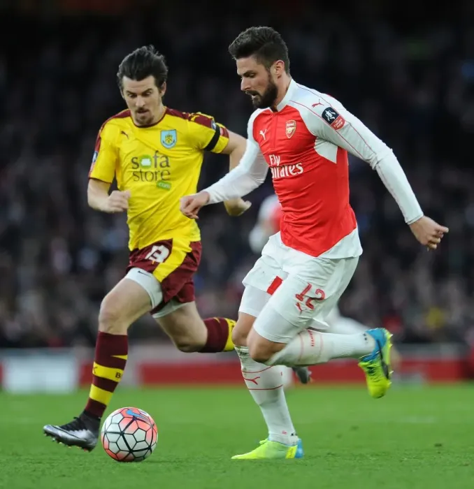 Framed Print : Clash of the Titans: Giroud vs. Barton in Arsenal's FA Cup Battle against Burnley Framed Print : Clash of the Titans: Giroud vs. Barton in Arsenal's FA Cup Battle against Burnley