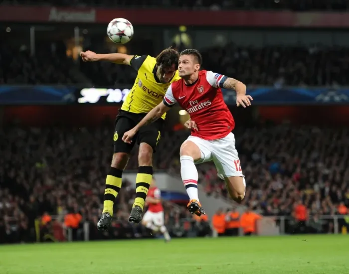 Framed Print : Clash of Titans: Giroud vs. Hummels - Arsenal vs. Borussia Dortmund, UEFA Champions League