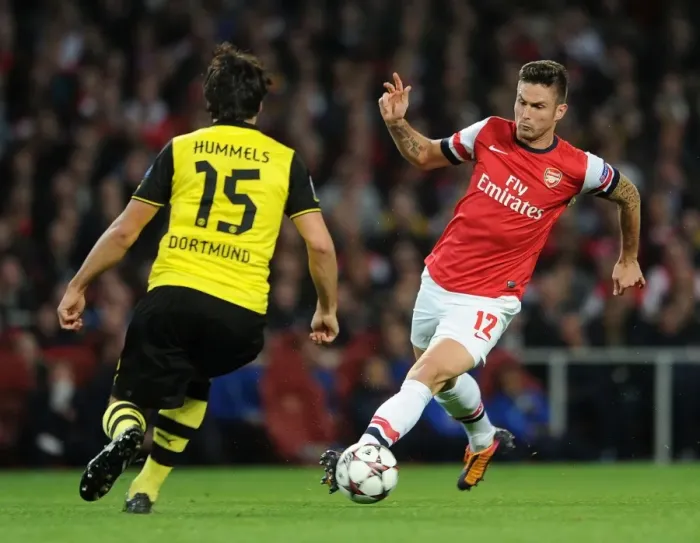 Framed Print : Clash of Titans: Giroud vs. Hummels - Arsenal vs. Borussia Dortmund, UEFA Champions League
