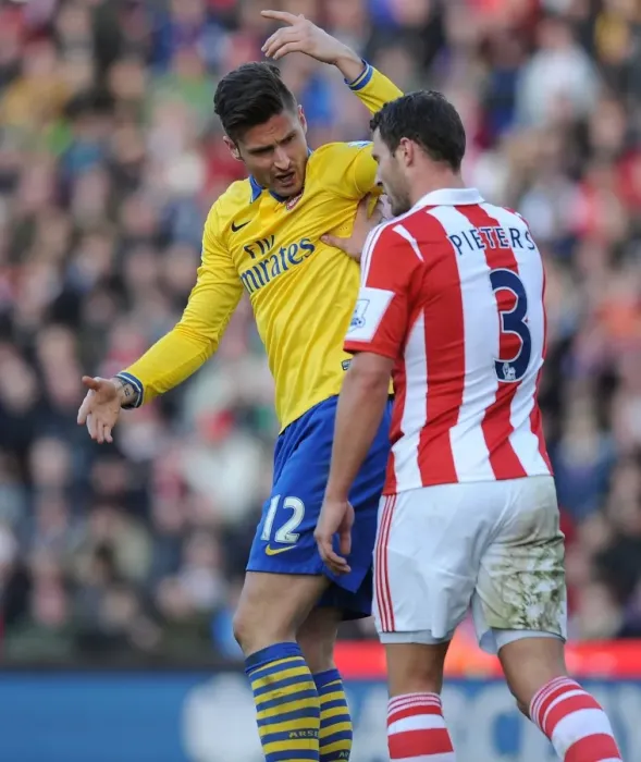 Framed Print : Clash of Titans: Giroud vs Pieters - Arsenal vs Stoke City Premier League Showdown