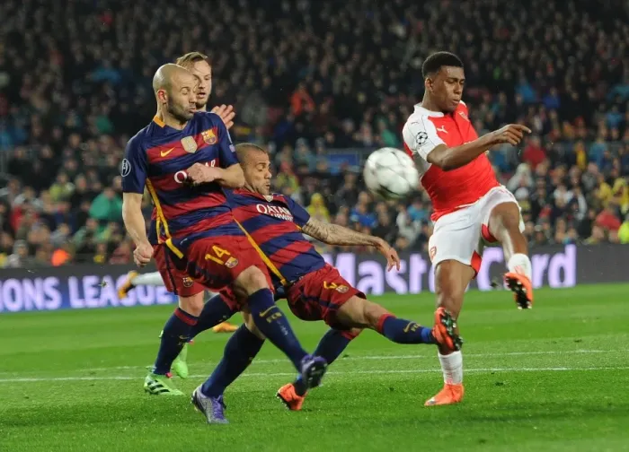 Framed Print : Clash of Titans: Iwobi vs. Alves, Rakitic, Mascherano - Arsenal's Brave Battle at Camp Nou