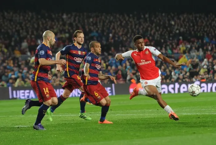 Framed Print : Clash of Titans: Iwobi's Brave Battle Against Alves, Rakitic, and Mascherano