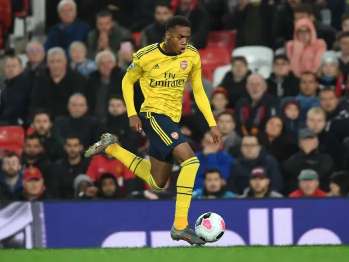 Framed Print : Clash of the Titans: Joe Willock's Premier League Showdown - Manchester United vs Arsenal