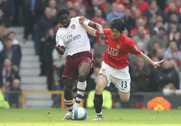 Framed Print : Clash of Titans: Kolo Toure vs Ji-Sung Park in Manchester United's 2:1 Victory over Arsenal, 2008 Framed Print : Clash of Titans: Kolo Toure vs Ji-Sung Park in Manchester United's 2:1 Victory over Arsenal, 2008