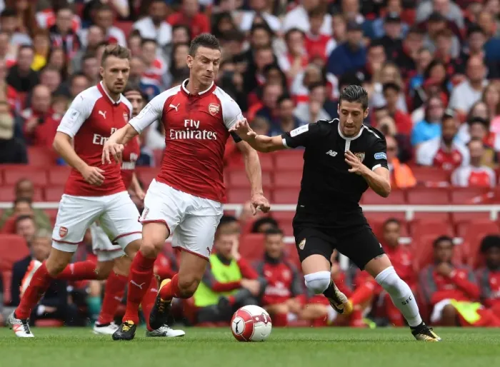 Framed Print : Clash of Titans: Koscielny vs. Escudero - Arsenal vs. Sevilla, Emirates Cup 2017-18