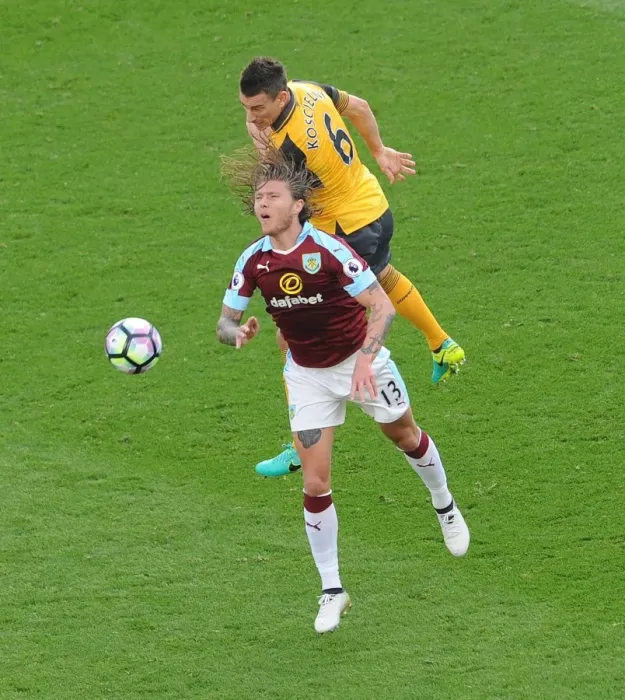 Framed Print : Clash of the Titans: Koscielny vs Hendrick - A Premier League Battle Framed Print : Clash of the Titans: Koscielny vs Hendrick - A Premier League Battle
