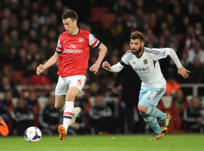 Framed Print : Clash of Titans: Koscielny vs. Nocerino - Arsenal v West Ham United, Premier League Framed Print : Clash of Titans: Koscielny vs. Nocerino - Arsenal v West Ham United, Premier League