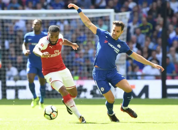 Framed Print : Clash of the Titans: Lacazette vs. Fabregas - Arsenal vs. Chelsea Showdown