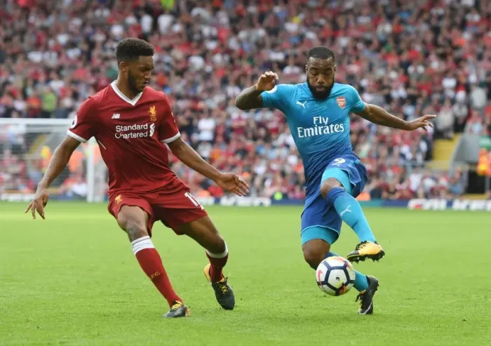 Framed Print : Clash of Titans: Lacazette vs. Gomez in Liverpool v Arsenal Premier League Showdown