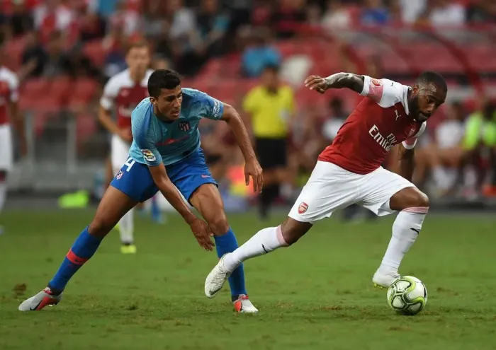 Framed Print : Clash of the Titans: Lacazette vs. Rodriguez - Arsenal vs. Atletico Madrid ICC 2018