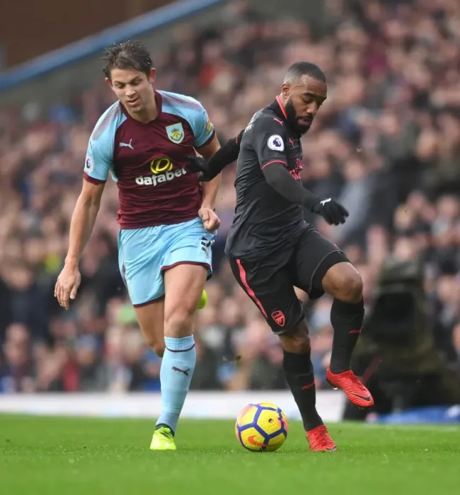 Framed Print : Clash of Titans: Lacazette vs. Tarkowski in Burnley vs. Arsenal Premier League Showdown Framed Print : Clash of Titans: Lacazette vs. Tarkowski in Burnley vs. Arsenal Premier League Showdown