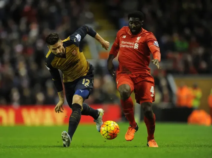 Framed Print : Clash of Titans: Liverpool vs. Arsenal, Premier League Showdown (2015-16) - Olivier Giroud vs. Kolo Toure Framed Print : Clash of Titans: Liverpool vs. Arsenal, Premier League Showdown (2015-16) - Olivier Giroud vs. Kolo Toure