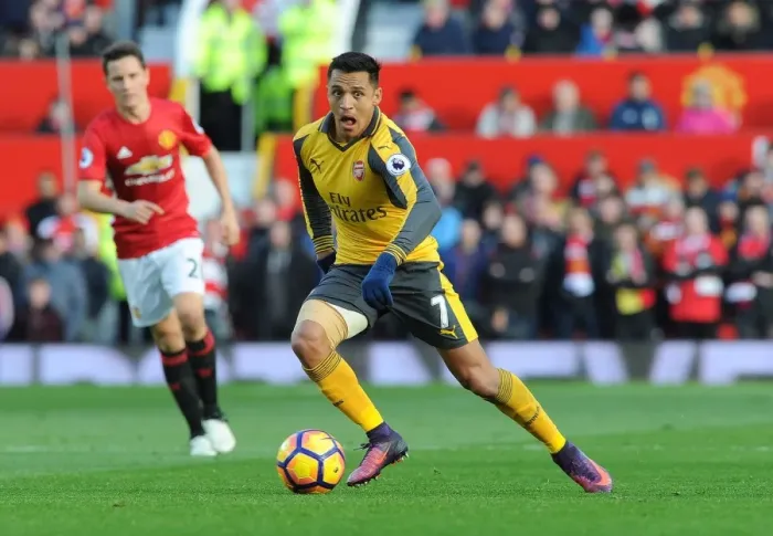 Framed Print : Clash of the Titans: Manchester United vs Arsenal - A Battle of Giants: Alexis Sanchez's Determined Stand at Old Trafford (Premier League 2016-17)