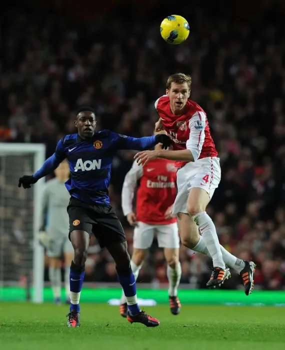 Framed Print : Clash of Titans: Per Mertesacker vs. Danny Welbeck - Arsenal vs. Manchester United, Premier League, 2012 Framed Print : Clash of Titans: Per Mertesacker vs. Danny Welbeck - Arsenal vs. Manchester United, Premier League, 2012