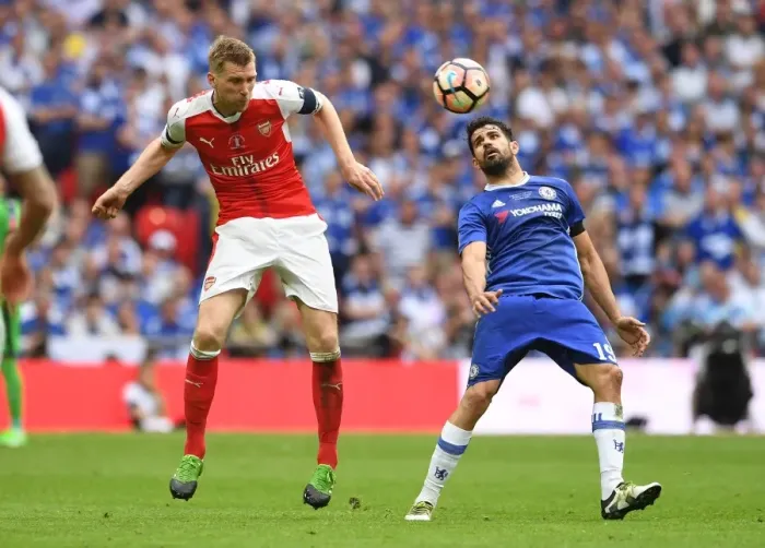 Framed Print : Clash of Titans: Per Mertesacker vs. Diego Costa - The FA Cup Final Showdown Framed Print : Clash of Titans: Per Mertesacker vs. Diego Costa - The FA Cup Final Showdown