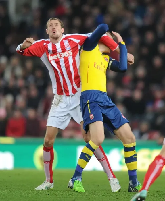 Framed Print : Clash of Titans: Per Mertesacker vs. Peter Crouch - Stoke City vs. Arsenal, Premier League, 2014 Framed Print : Clash of Titans: Per Mertesacker vs. Peter Crouch - Stoke City vs. Arsenal, Premier League, 2014