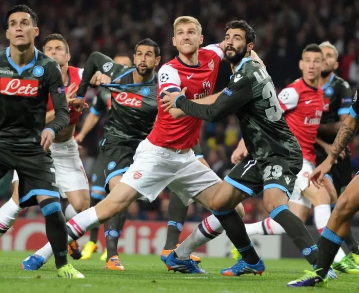 Framed Print : Clash of Titans: Per Mertesacker vs. Raul Albiol - Arsenal vs. Napoli, UEFA Champions League