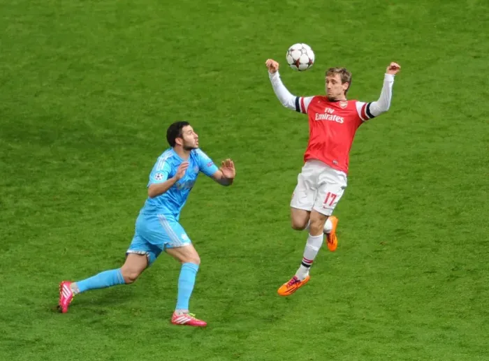 Framed Print : Clash of Titans: Monreal vs. Gignac - Arsenal vs. Marseille, UEFA Champions League