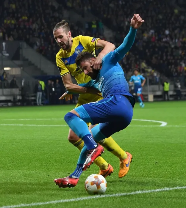 Framed Print : Clash of Titans: Nemanja Milunovic vs. Olivier Giroud in FC BATE Borisov vs. Arsenal UEFA Europa League Showdown