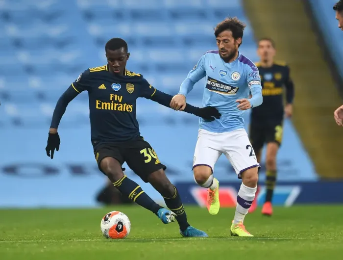 Framed Print : Clash of Titans: Nketiah vs. Silva - Manchester City vs. Arsenal, Premier League 2019-2020: A Battle of Skills and Determination