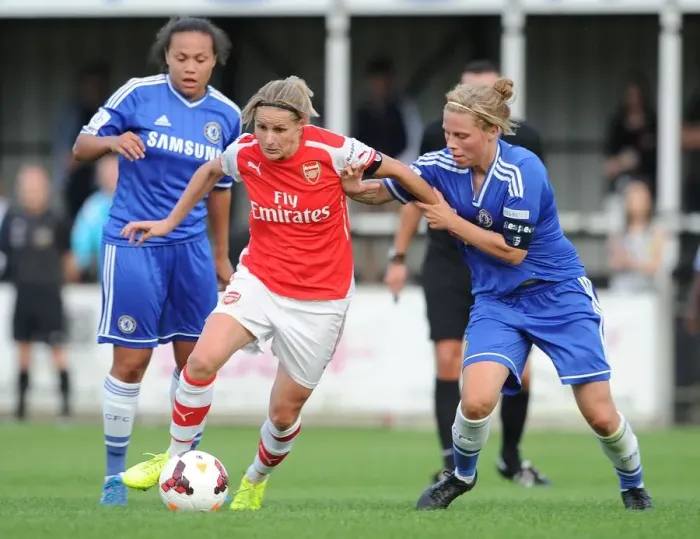 Framed Print : Clash of Titans: Nobbs, Spence, and Flaherty - A Football Battle between Chelsea and Arsenal