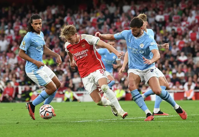 Framed Print : Clash of Titans: Odegaard vs Dias-Ake - Arsenal vs Manchester City Showdown (2023-24)
