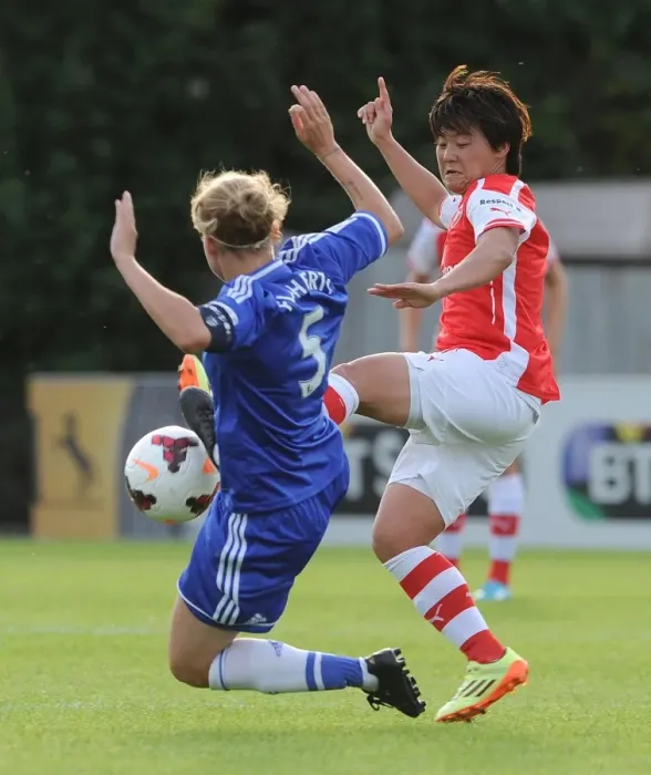 Framed Print : Clash of Titans: Ohno vs. Flaherty in WSL Showdown - A Football Battle