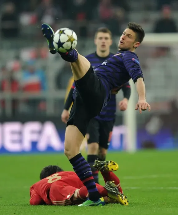 Framed Print : Clash of Titans: Olivier Giroud vs Javier Martinez - Bayern Munich vs Arsenal, UEFA Champions League 2013
