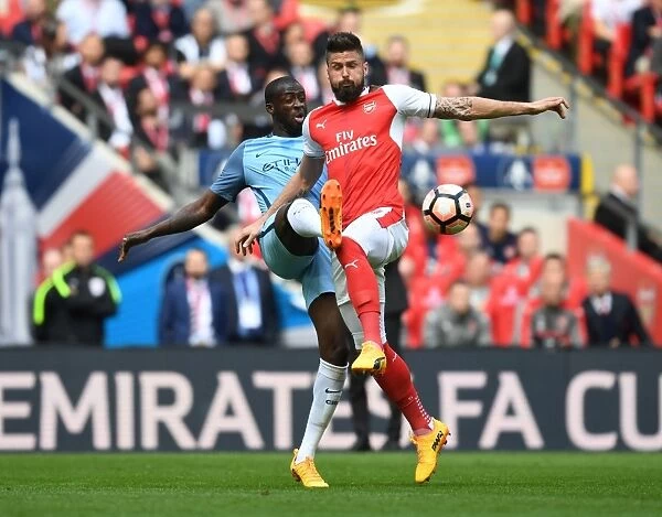 Clash of Titans: Olivier Giroud vs Yaya Toure - The Emirates FA Cup Semi-Final Showdown