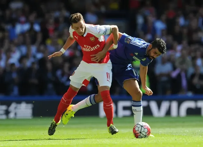 Framed Print : Clash of Titans: Ozil vs Costa - Premier League Showdown